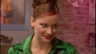 Natasha Beaumont in Green Satin Blouse